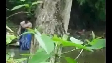 Village Lady Taking Bath Near River