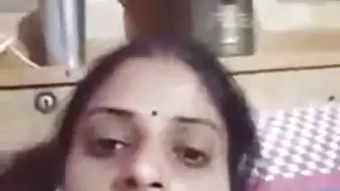 Bhabhi on video call getting horny pressing boob