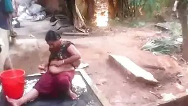 Chubby Indian temptress loves her sex hole and washes it in a trough