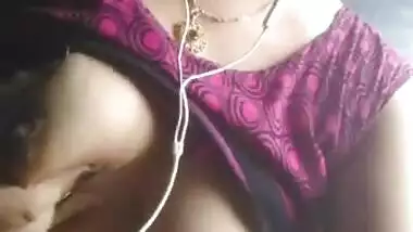 Cute girl playing with boobs