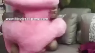 Indian teen is so horny that rubs twat against big plush toy on camera