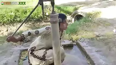 Young village school girl taking a bath in a sari and caught on camera