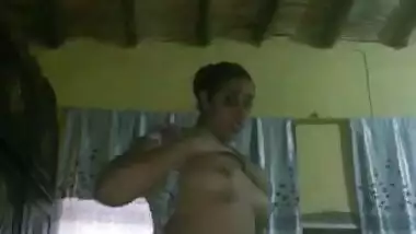 Very cute village bhabi showing her big boobs on mobile cam