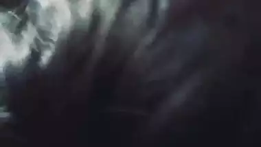 Slim girlfriend smiling while giving handjob and blowjob