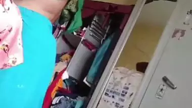 Grandmother wearing blouse and showing naked boobs