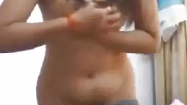 Indian girl undressing in front of camera