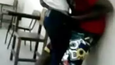 Young India College girl kissing in classroom