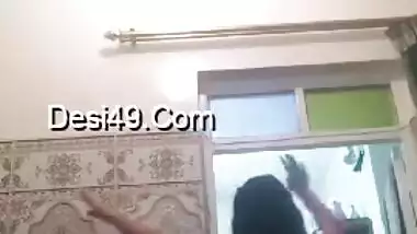 Long-haired Indian babe with awesome tits likes to dance being naked