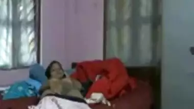 Indian GF talking on the phone and masturbating.