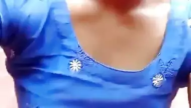 Desi girl in blue suit showing her pussy