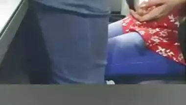 Giving blowjob in office
