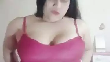 Big boob nude girl shows her butt and squeezes her boobs
