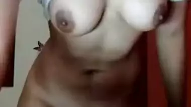 Desi pulls white T-shirt up and exposes small boobs with hard nipples