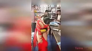 Lewd Desi aunty flashes her hairy pussy in the shop