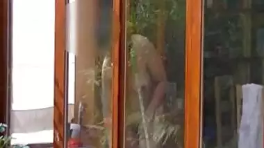 Neighbour cleaning windows.