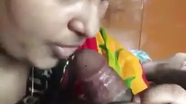 Beautiful widow aunty kissing licking sucking young bull cock