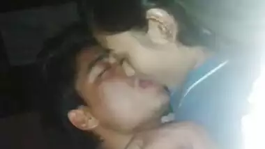 teen couple kissing 